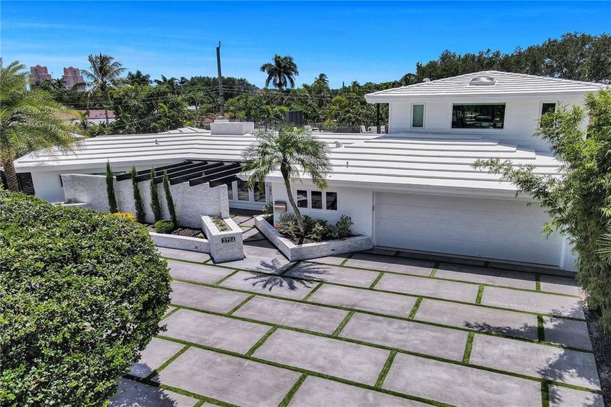 Incredible 3/3 in the heart of CORAL RIDGE A RATED SCHOOLS! Completely upgraded from head to toe, no expense spared! Bathrooms remodeled, custom closets, remote bedroom shades, fully restored terrazzo flooring, Sonos installed throughout the home, luscious landscaping with beautiful landscape lighting, projection TV with electric drop down screen. Hurricane sliders upstairs and downstairs, some upgraded plumbing, upgraded electrical, roof recently sealed, termite control warranty for 5 years, home warranty including all appliances and air conditioning for one year.  Close to beaches, restaurants, shops and airport!