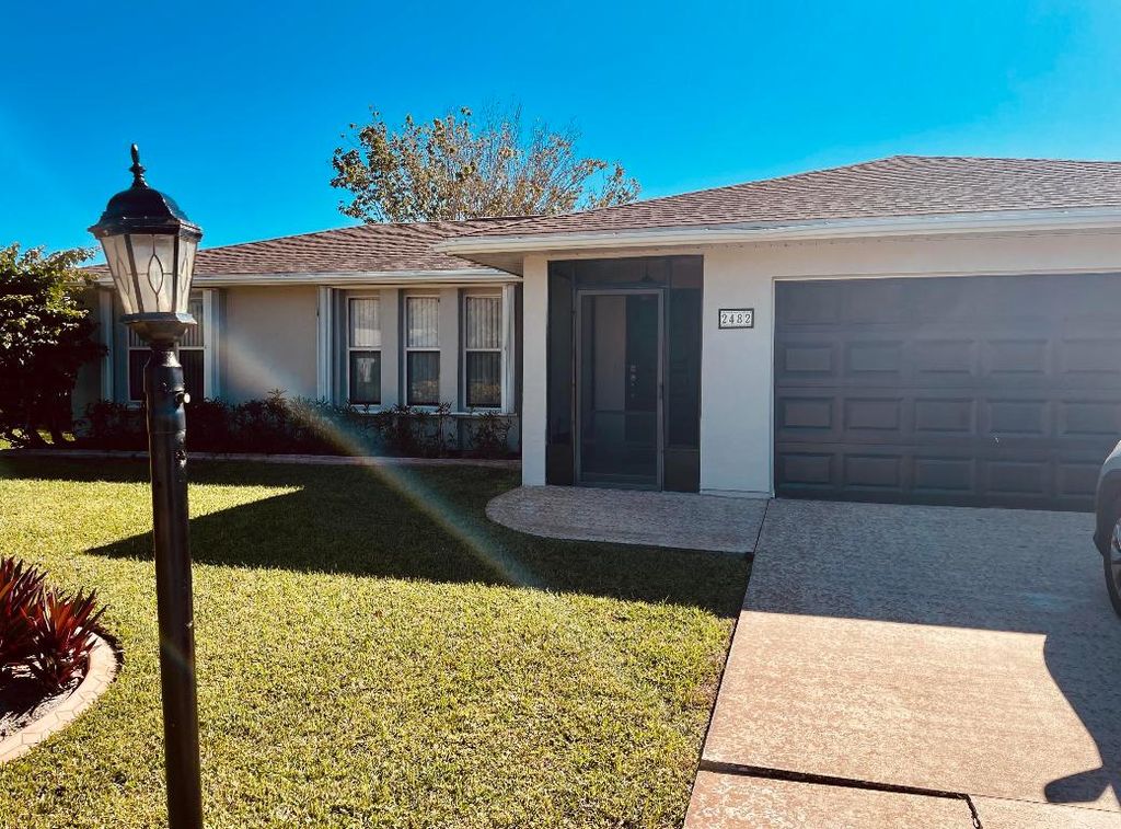 Photo of 2482 SE Caligula Avenue, Port Saint Lucie, FL 34952 (MLS # R10961936)