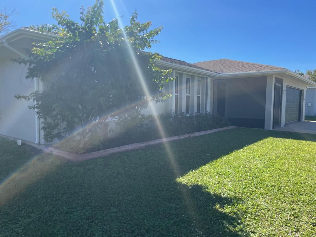 Photo of 2482 SE Caligula Avenue, Port Saint Lucie, FL 34952 (MLS # R10961936)