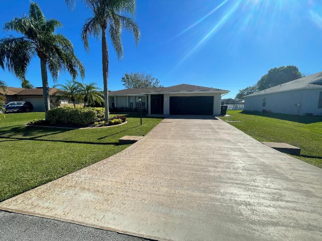 Photo of 2482 SE Caligula Avenue, Port Saint Lucie, FL 34952 (MLS # R10961936)