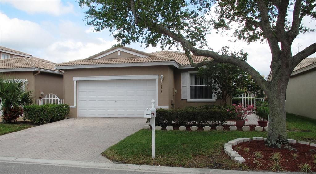 Photo of 2154 Man Of War, West Palm Beach, FL 33411 (MLS # R10697350)