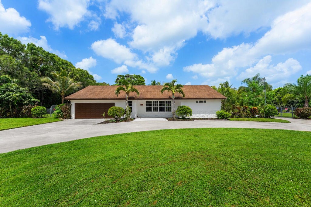 Photo of 5313 Colbright Road, Lake Worth, FL 33467 (MLS # B26054813)