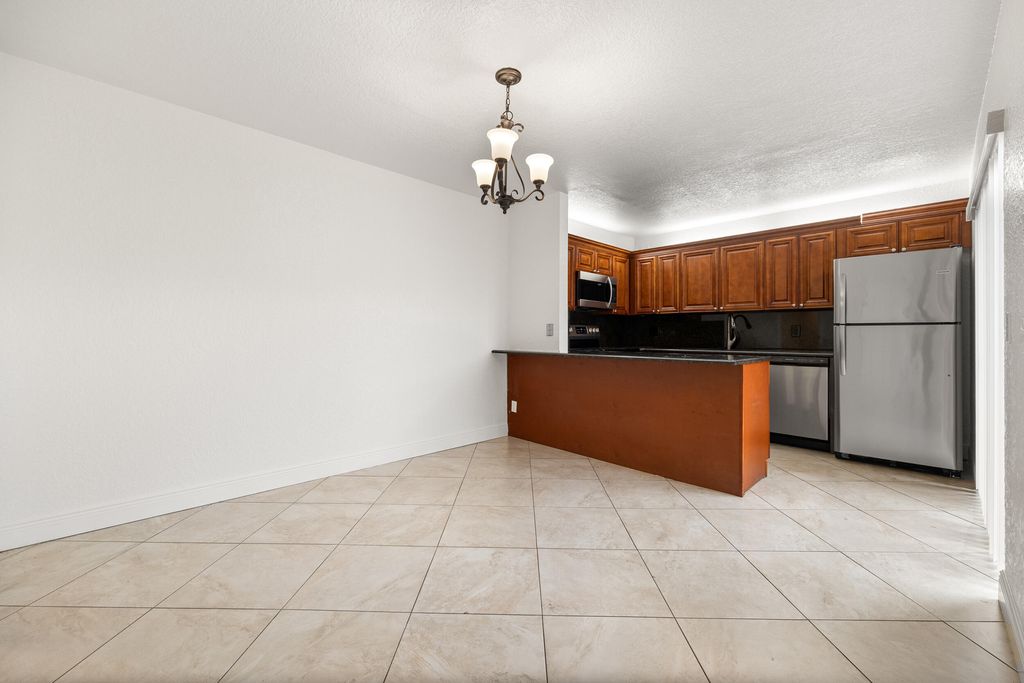 Photo of 208 Lake Arbor Drive, Palm Springs, FL 33461 (MLS # R10991899)