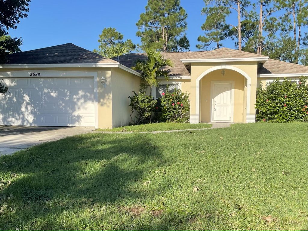 Photo of 3586 SW Conibear Street, Port Saint Lucie, FL 34953 (MLS # B26010212)