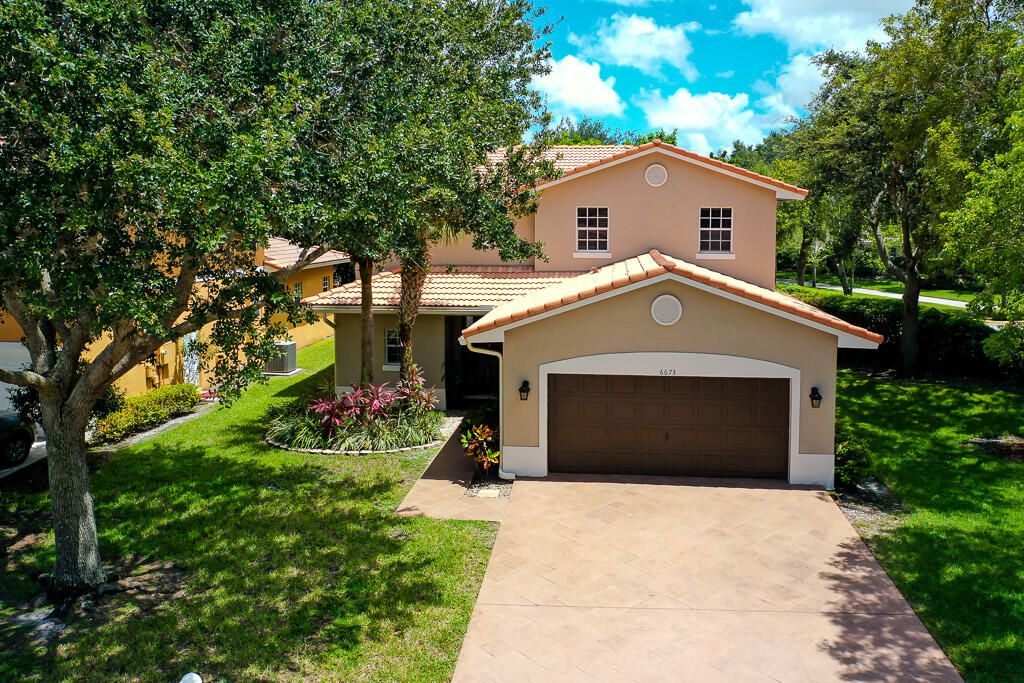 Photo of 6673 Eagle Ridge Drive, Greenacres, FL 33413 (MLS # R11120257)