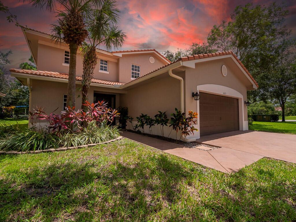 Two Story, 4 Bedroom, 2.5 Bathroom plus loft, 2 Car Garage Home situated on a spacious corner lot, in the 24 hr manned gated community of River Bridge. This home offers a complete set of hurricane panels, making storm prep a breeze. Inside, the interior aesthetic is defined by wood-look tile floors that seamlessly traverse the living spaces. Crown molding, great lighting, high ceilings and neutral colors make this living space fresh and airy. The stairway is the focus point of the living area. Featuring vinyl stair treads and flooring on the upper level contribute to both elegance and ease of maintenance. The updated kitchen features granite countertops, white cabinetry, pantry, and stainless steel appliances.