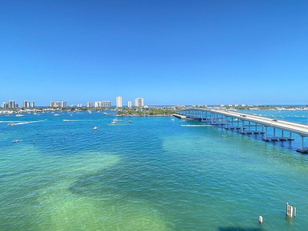 Million-dollar ocean and sunrise views from this 10th-floor 2BR + den, 2BA condo overlooking the Intracoastal. Open concept with split floor plan, LVT flooring (except primary bath), impact glass, and semi-private elevator. Spacious owner's suite with dual walk-in closets, jetted tub, glass shower, and double vanity. Bonus room perfect for office or guest space. Built-ins in all closets. Assigned garage parking near elevator and climate-controlled storage. Pet-friendly, 24/7 manned gate, valet, and a newly renovated rooftop oasis with pool, spa, BBQ, tennis, pickleball, bocce, fitness center, marina with dry dock, and no fixed bridges.