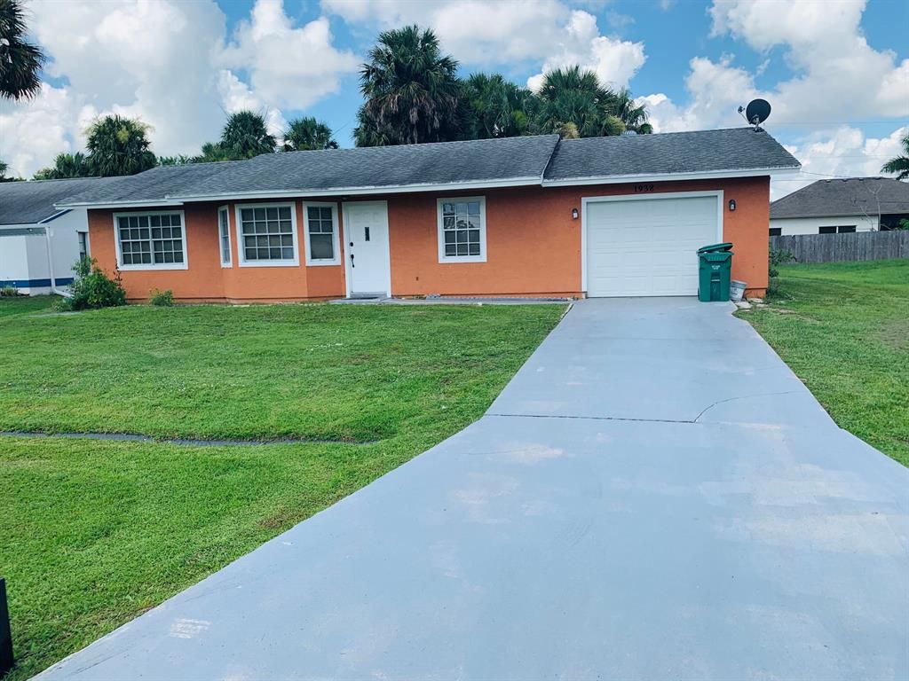 Photo of 1938 SW Gold Lane, Port Saint Lucie, FL 34953 (MLS # R10741328)
