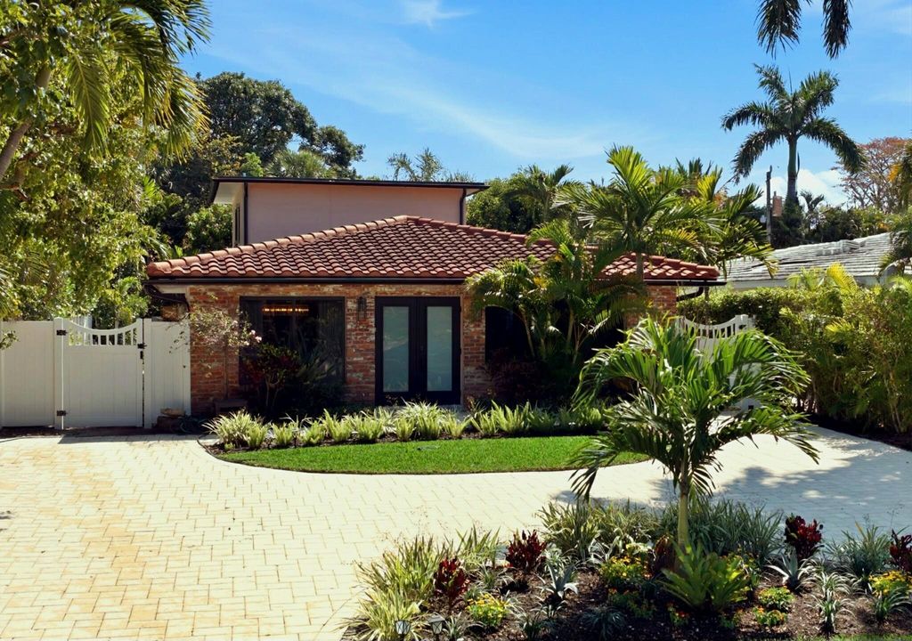 Photo of 702 S Atlantic Drive, Lantana, FL 33462 (MLS # B26012657)