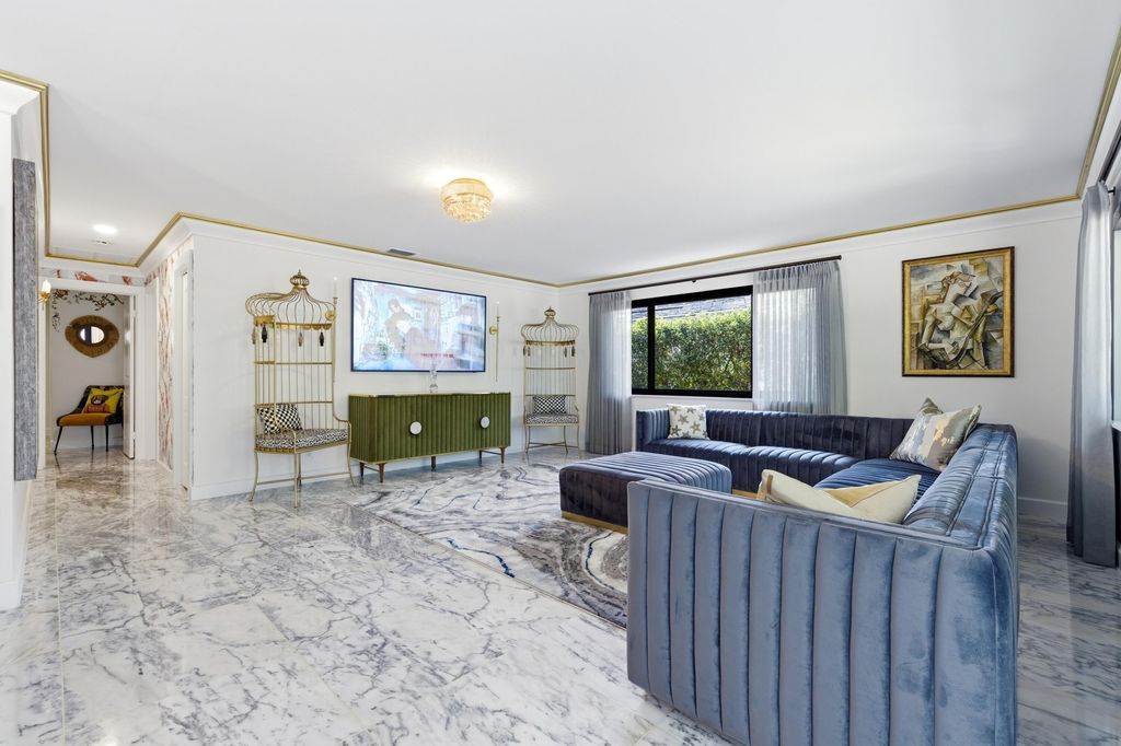 Photo of 702 S Atlantic Drive, Lantana, FL 33462 (MLS # B26012657)