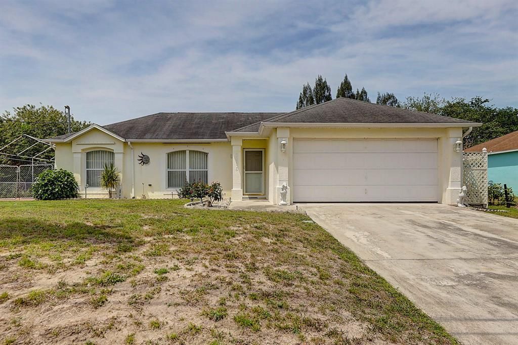 Photo of 3616 SW Hale Street, Port Saint Lucie, FL 34953 (MLS # R10790755)