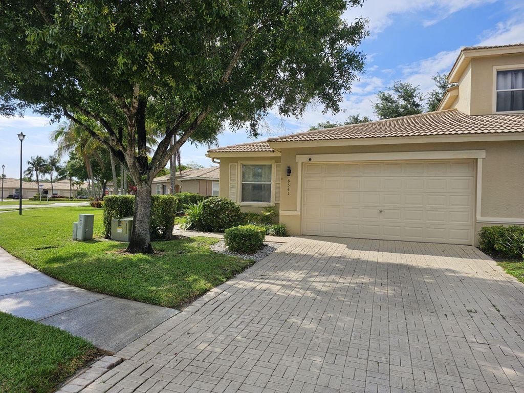 Photo of 8541 Water Cay, West Palm Beach, FL 33411 (MLS # B26029408)