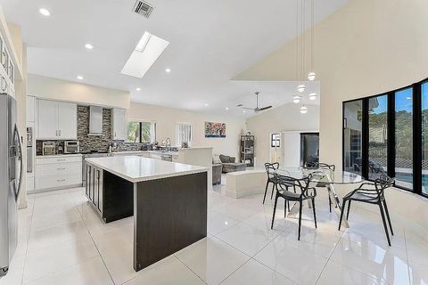 Tiny photo for 4551 NW 26th PL, Boca Raton, FL 33434 (MLS # B26024619)