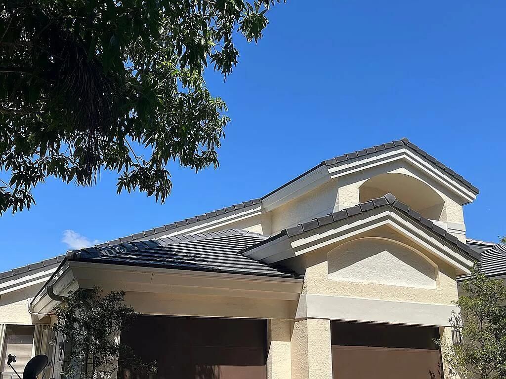 Photo of 4551 NW 26th PL, Boca Raton, FL 33434 (MLS # B26024619)