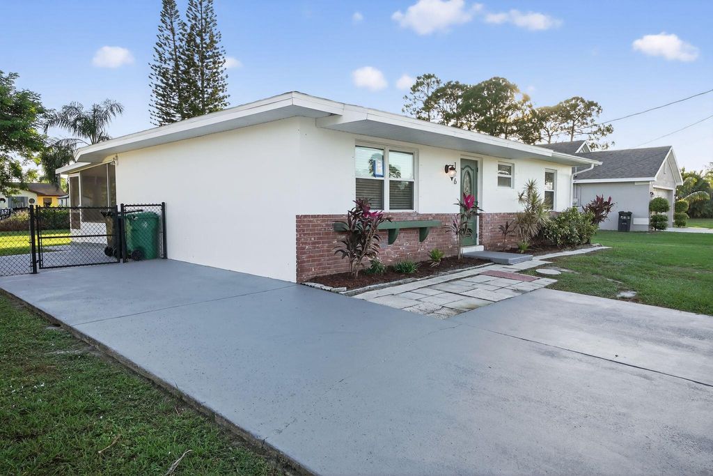 Photo of 126 SW Lakehurst Drive, Port Saint Lucie, FL 34983 (MLS # R11138013)