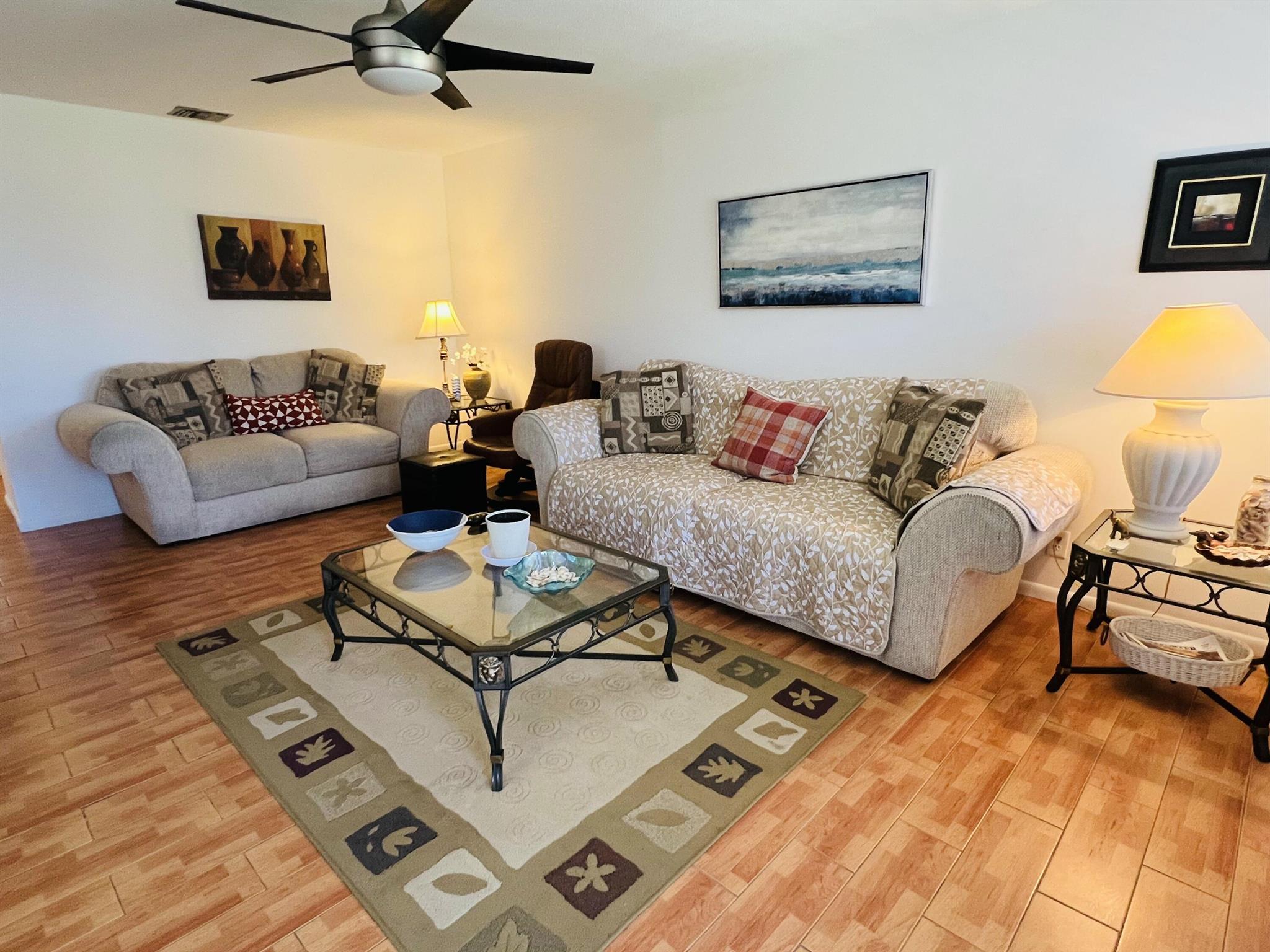Welcome to Coventry B in Century Village--West Palm Beach's sought-after 55+ gated community. This light-filled 2-bedroom, 1-bath residence offers an easy, low-maintenance lifestyle near beaches, hospitals, shopping, and dining. Inside, enjoy an updated kitchen with stainless steel appliances, an upgraded bath, and cable-ready comfort. A furnished option makes move-in simple. Community amenities include a fitness center, multiple pools, tennis courts, laundry in the building, and added storage. If you're seeking a quiet, convenient home base with quick access to everything West Palm Beach offers, this is the one. No pets per community rules. Available now--schedule your private tour today.