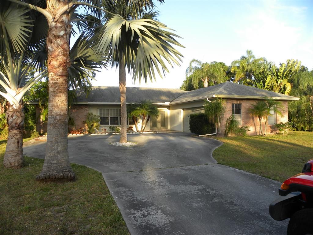 Photo of 2086 SE Morningside Boulevard, Port Saint Lucie, FL 34952 (MLS # R10704159)
