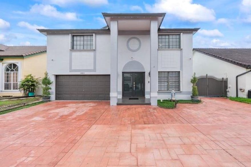 Motivated seller! Spacious 5BR/3 full BA home with 2-car garage plus 5-car driveway. Backyard oasis features a pergola, synthetic grass, board wall with generator cover, and a semi-ground pool to cool off, secured by fencing on cement base. Home upgrades include new metal roof with solar panels, impact front door, accordion shutters, LED lighting, and exterior security cameras. Remodeled kitchen with stainless steel appliances, 3 full modern bathrooms, tile flooring on first floor, laminate upstairs, organized garage with side closets, and independent laundry room with cabinets. Community offers tennis courts, pool, and playground. A true move-in ready home blending comfort, style, and modern upgrades. Attached you will find the estoppel, questionnaire, and seller disclosure forms. For community rules and regulations, please contact the listing agent directly.