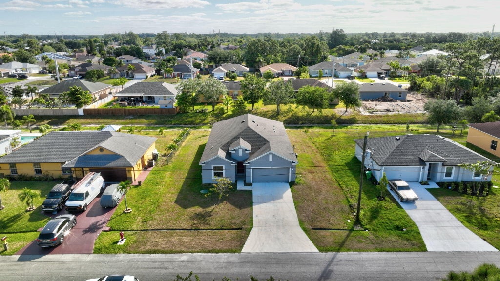 Photo of 2351 SW Halissee Street, Port Saint Lucie, FL 34953 (MLS # R10979212)