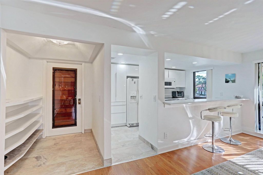 Photo of 318 Brackenwood Circle, Palm Beach Gardens, FL 33418 (MLS # R11117791)