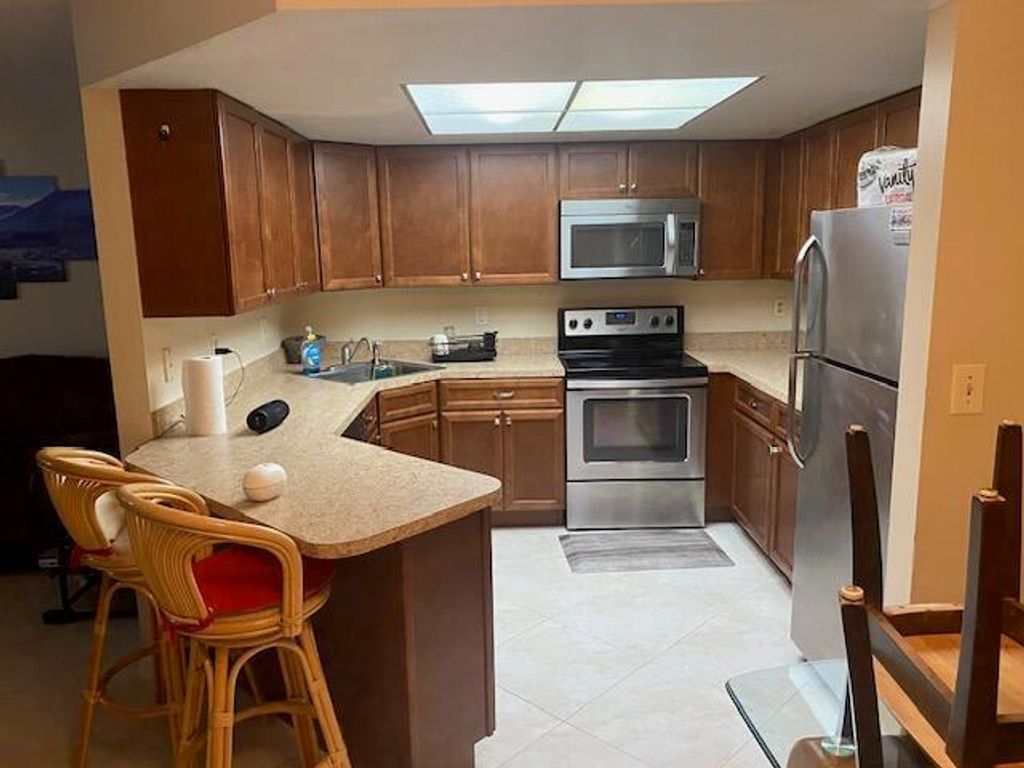 Photo of 6556 Chasewood Drive E #A, Jupiter, FL 33458 (MLS # R11104705)