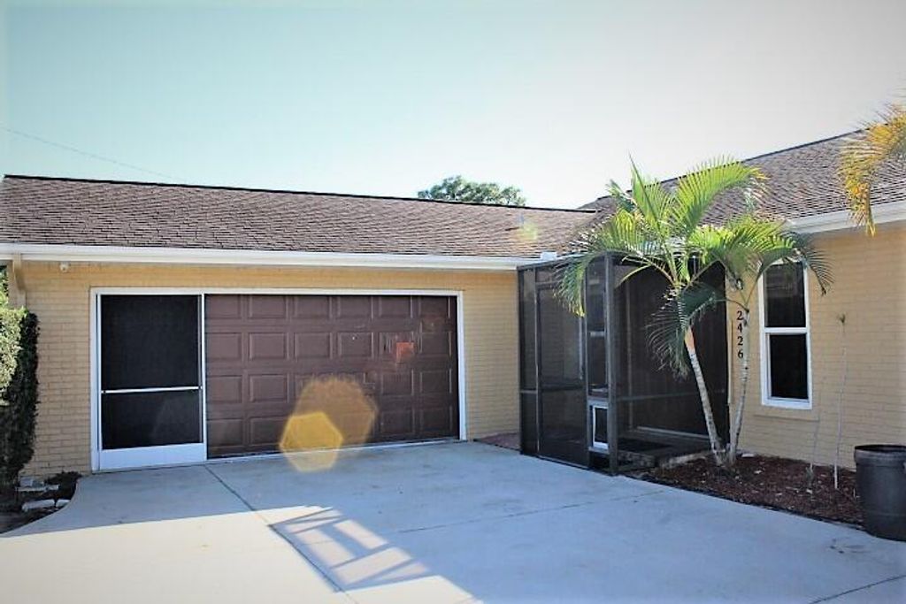 Photo of 2426 SW Cameo Boulevard, Port Saint Lucie, FL 34953 (MLS # R10765587)