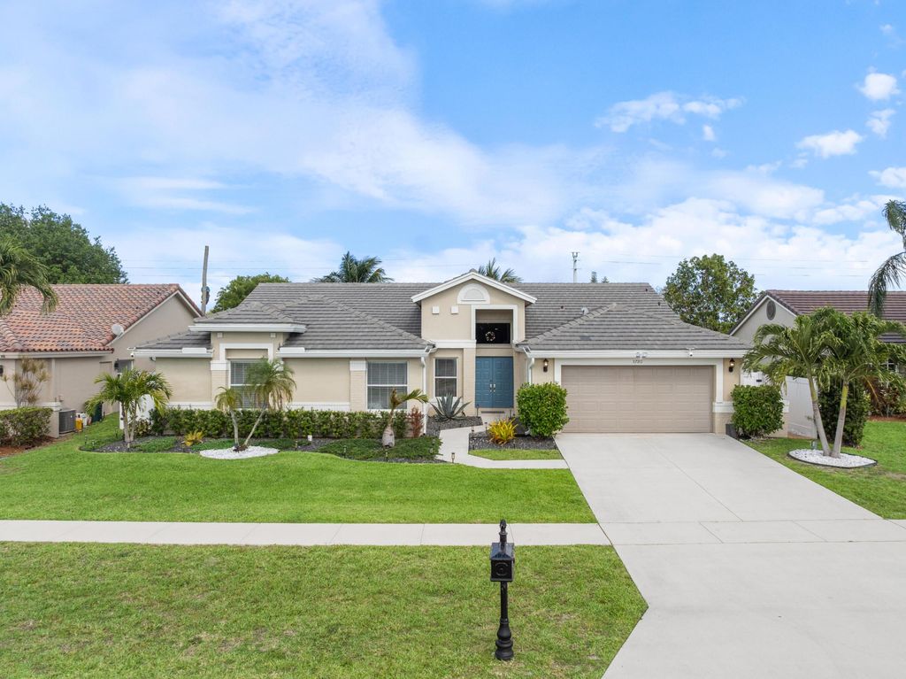 Photo of 3780 Cypress Lake Drive, Lake Worth, FL 33467 (MLS # B26013661)