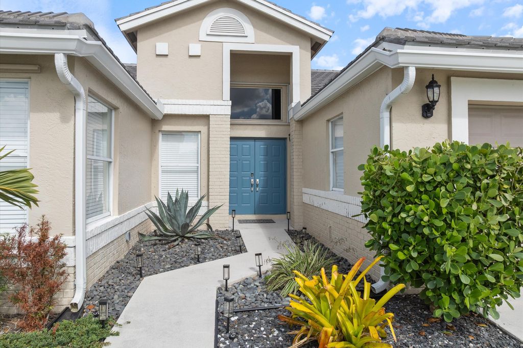 Photo of 3780 Cypress Lake Drive, Lake Worth, FL 33467 (MLS # B26013661)