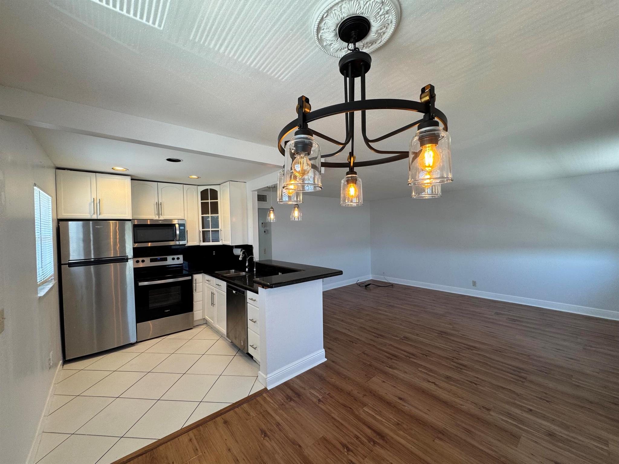 True corner condo in Kings Point 55+. Bright, sunny, move-in ready, corner unit, 2nd floor condo, close to the Monaco pool & Bistro (Best burger in town)! Laminate floors, freshly painted & well maintained.Great solution for the easygoing Florida lifestyle with access to resort style amenities: 3 Clubhouses, 6 pools and 2 golf courses (Robert T. Jones), on site cafe, bistro, beauty/barber shop, live entertainment, movies, courtesy bus to shopping hourly, indoor/outdoor heated pools, indoor resistance pool and lap pool; only 6 miles to downtown Delray Beach . First, last, security.