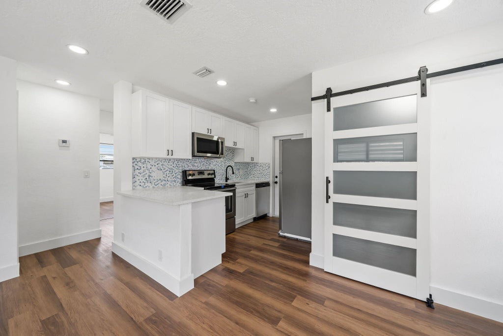 Photo of 1326 8th Street, West Palm Beach, FL 33401 (MLS # B26039680)