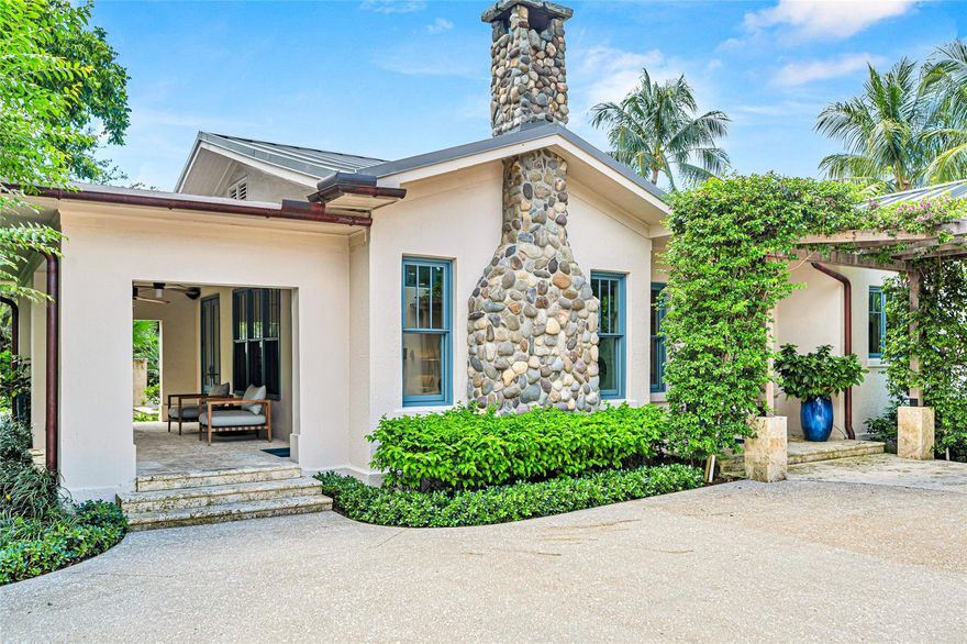 Victoria Park's most recognized home sits atop the ridge encompassing almost three full lots. Newly renovated and expanded into a unique residential compound adding a spectacular resort-quality pool and cabana house, a new two car garage with a 2-bedroom guest apartment. The main house has 3 bedrooms, 2 bathrooms, a wood-burning fireplace, automated lighting and audio, and a 35-foot screened room. Each bedroom has French doors to a private terrace cantilevered over the new amazing pool. Above the garage, is a guest suite with a living room, kitchenette, bedroom, and bunk room. The pool area is an inviting oasis, featuring waterfalls and a luxurious hot tub. The cabana is equipped with an outdoor TV, full kitchen, bath, and open-air shower. Offered turn-key furnished for a quick move-in.