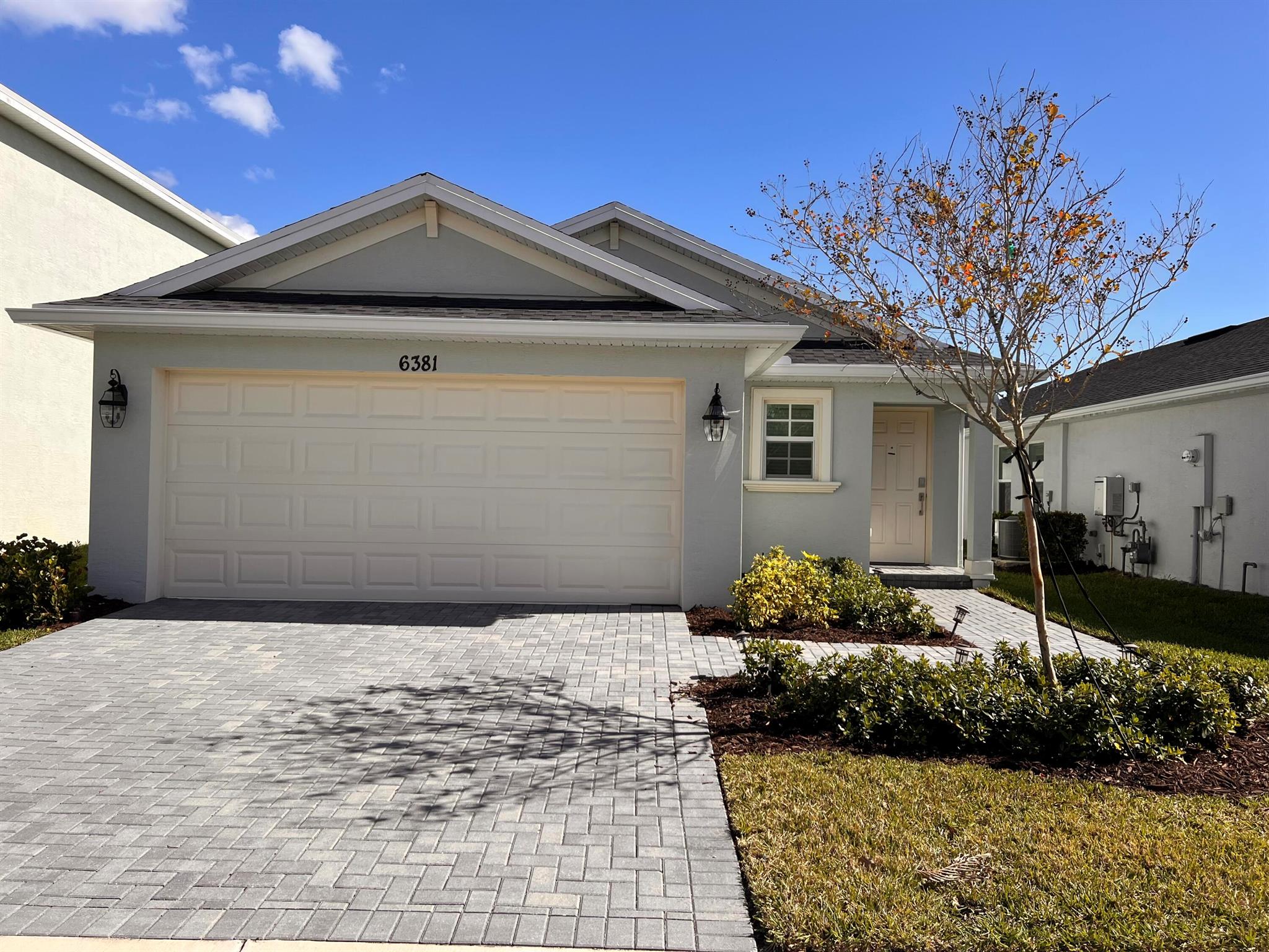 Welcome to this exquisite 2023 home nestled in the brand new community of Bristol at Wylder! This modern and spacious residence boasts 3 bedrooms, 2 bathrooms, and a double car garage, all complemented by a stunning lake view, perfect for soaking up the warm Florida sunshine.Step inside to discover an upgraded kitchen featuring top-of-the-line stainless steel appliances, including a sleek gas stove, and a versatile cooking island that doubles as a breakfast area. The formal dining area is ideal for hosting large gatherings and seamlessly flows into the great room, which offers breathtaking views of the lanai and the serene lake through the expansive sliding doors.The luxurious main suite is a true retreat, complete with a walk-in closet, and a beautifully tiled shower.