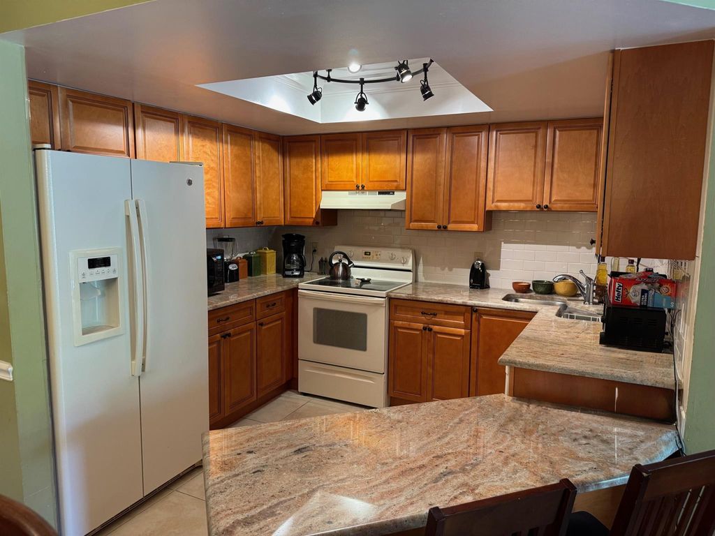 Photo of 6527 Chasewood D Drive #D, Jupiter, FL 33458 (MLS # R11085095)