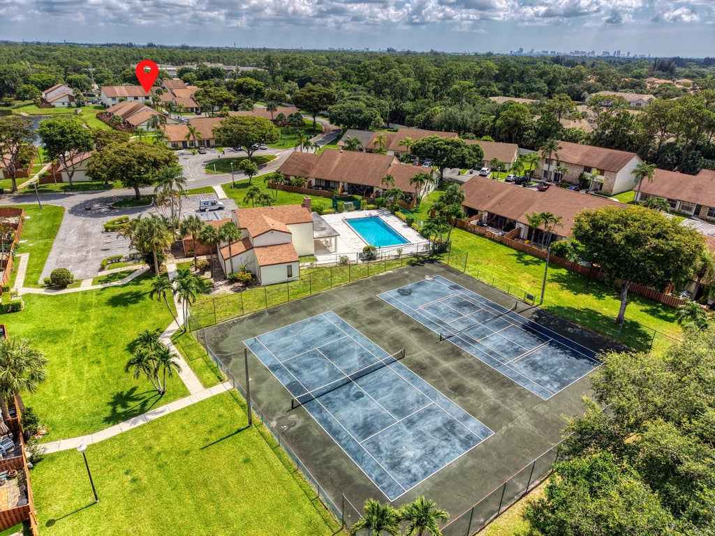 Photo of 1030 Parkside Green Drive #A, Greenacres, FL 33415 (MLS # B26047571)