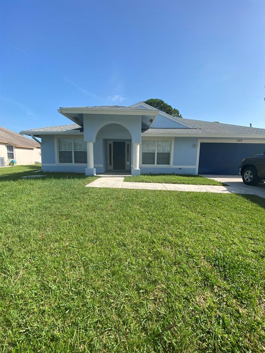 Photo of 249 NE Glentry Avenue Ave, Port St Lucie, FL 34983 (MLS # R10808313)