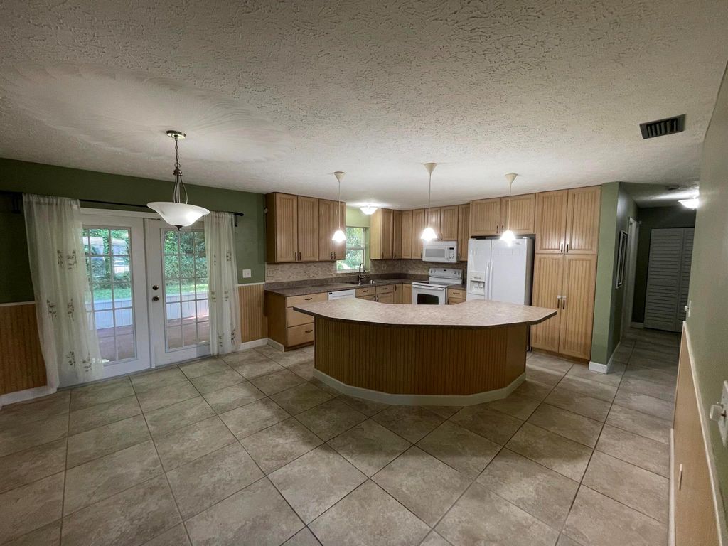 Photo of 2616 Newport Drive, Fort Pierce, FL 34982 (MLS # R11114891)