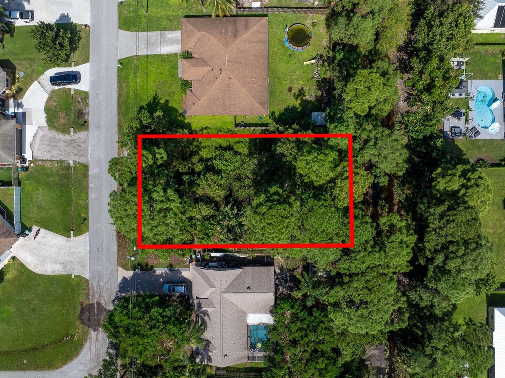 Photo of 2989 SW Collings Drive, Port Saint Lucie, FL 34953 (MLS # R11028765)