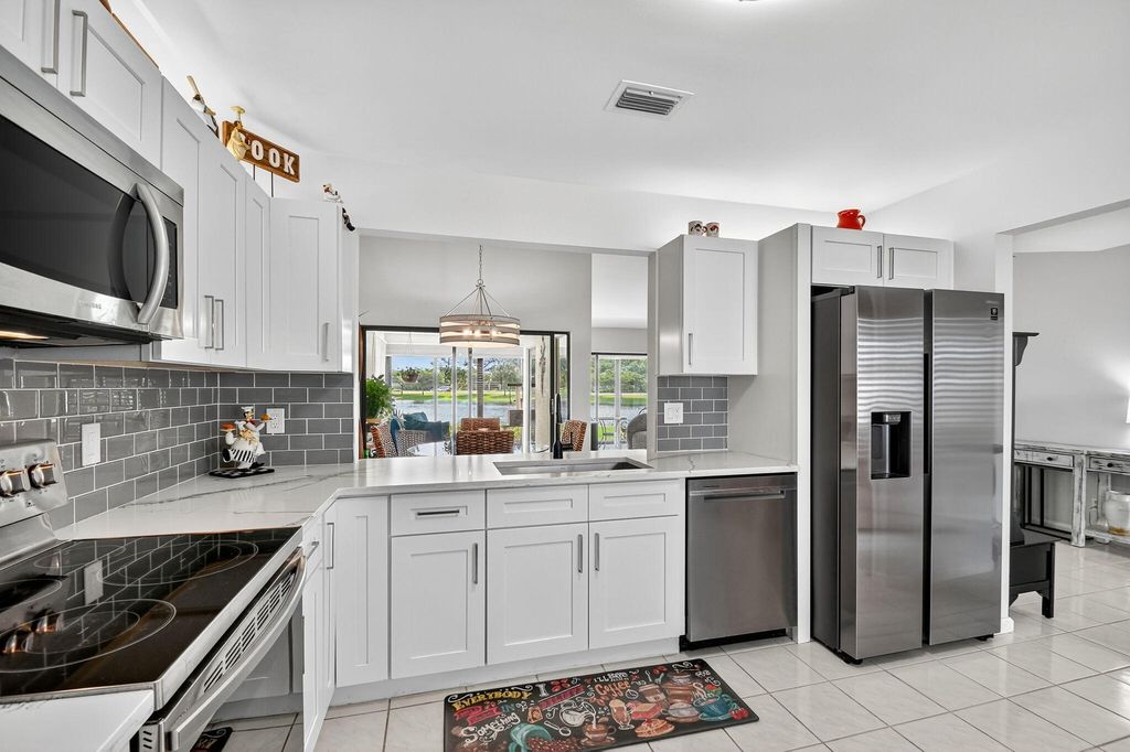 Photo of 5710 Parkwalk Circle E, Boynton Beach, FL 33472 (MLS # R11145197)
