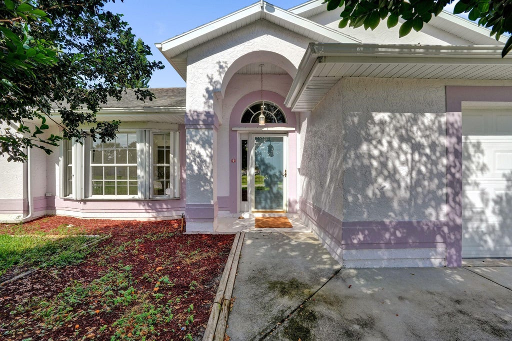 Photo of 1212 SE Petunia Avenue, Port Saint Lucie, FL 34952 (MLS # B26041782)
