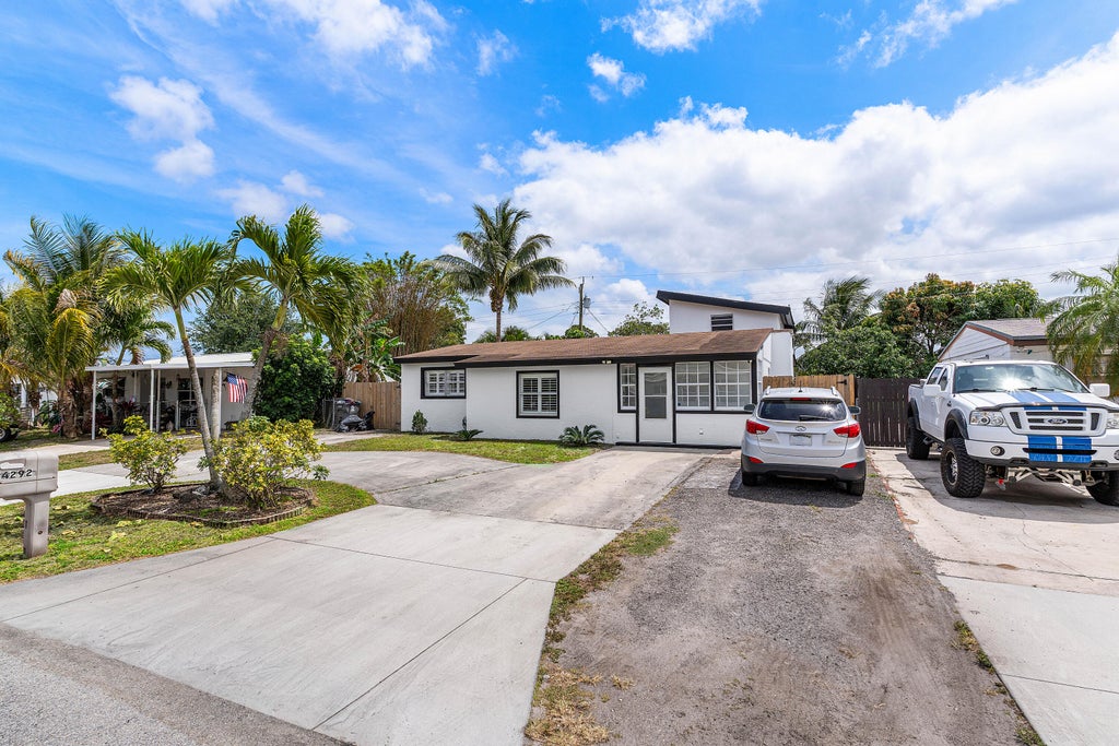 Photo of 4292 Winchester Ln, West Palm Beach, FL 33406 (MLS # R11084303)