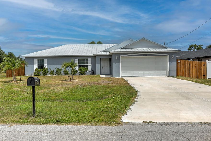 Move-In Ready 3/2/2 Home East of US1 in Port St. Lucie - Oversized Lot & Prime Location! Discover this stunning CBS single-family home located in highly desirable Port St. Lucie, Florida! Built just 2 years ago, this gem offers the perfect combination of comfort, quality, and convenience. Key Features Include: Metal Roof & Impact Windows - Built to last and storm-ready. Tile Flooring Throughout - Easy maintenance & modern look. Fully Fenced Yard - Ideal for pets, play, and privacy. All Appliances Included - Move-in ready from day one. Generator with Electric Hookup - Peace of mind during outages. No HOA - Enjoy freedom and flexibility. Located close to schools, beaches, shopping, parks, restaurants and hospitals, this home of offers the best of Florida living just minutes from everything.