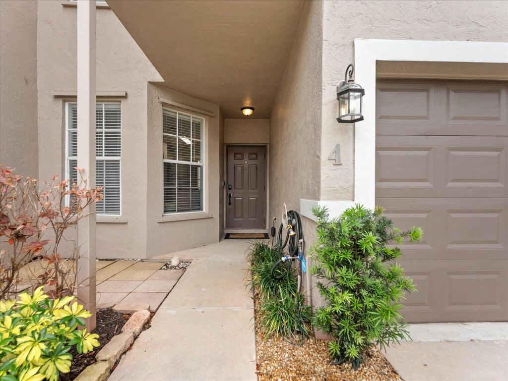 Photo of 10240 Via Hibiscus #4, Boca Raton, FL 33428 (MLS # B26028416)