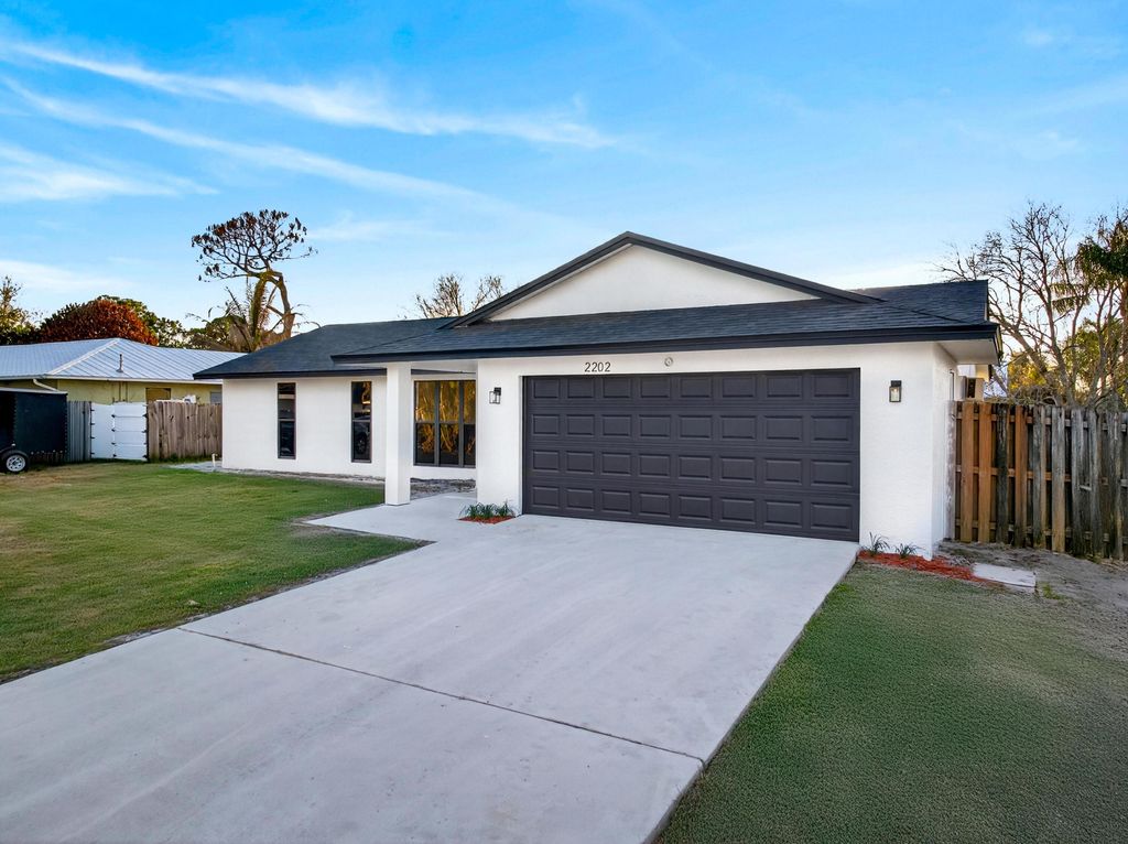 Photo of 2202 SE Glover Street, Port Saint Lucie, FL 34984 (MLS # R11165779)