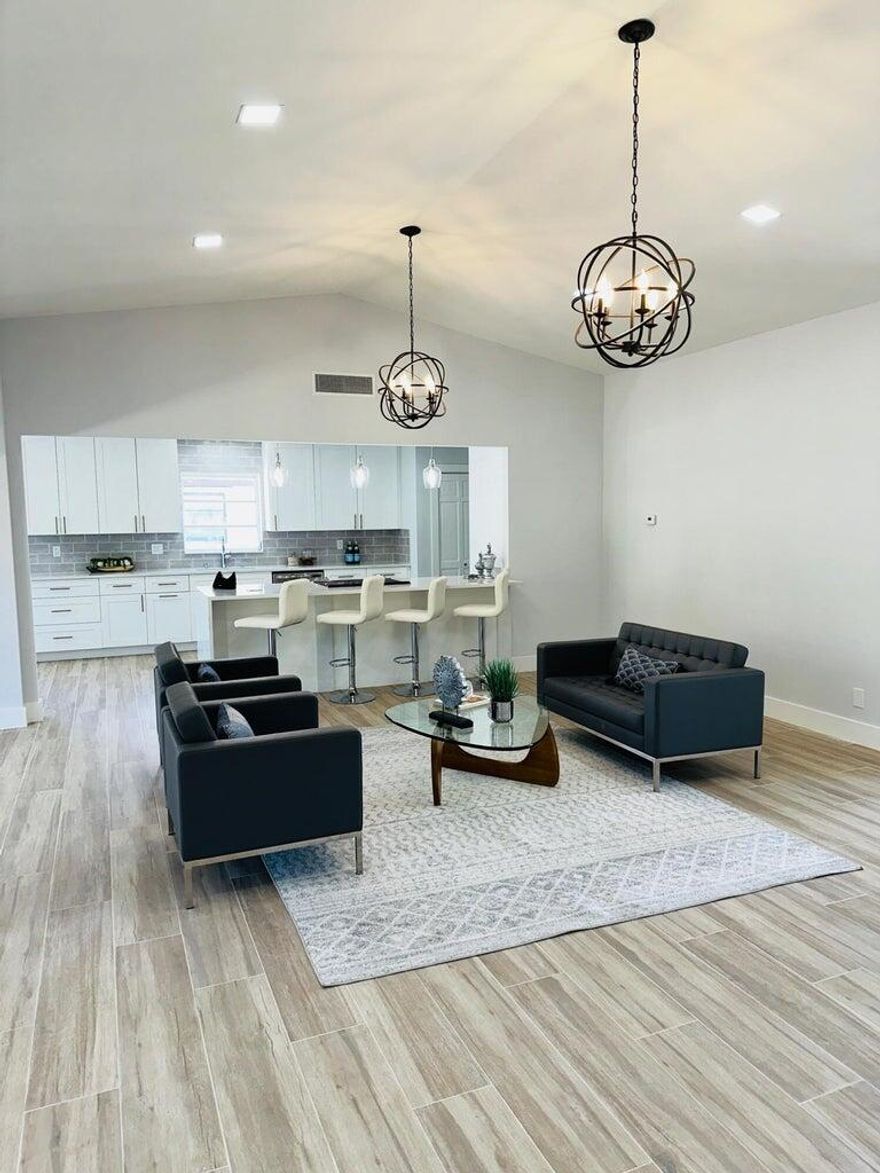 **LOW HOA** MOVE-IN ready! This 3 bed/2 bath home offers MODERN TOUCHES. CATHEDRAL CEILIINGS, SPACIOUS KITCHEN open living spaces, WATERFALL QUARTZ COUNTER and SOFT CLOSE CABINETRY. MODERN BATHROOMS with FLOATING VANITIES, PEBBLESTONE SHOWER FLOOR. LIGHT WOOD-LIKE TILE FLOORS give the feel of a beach cottage. GLOBE CHANDELIERS, UNIQUE FIXTURES complete this homes elegance. LARGE HIS AND HERS WALK-IN CLOSETS. S-TILE ROOF unique to community. Backyard patio perfect for entertaining. Make this your winter home getaway or full-time residence! Minutes to shopping, restaurants, beaches and nightlife of Atlantic Ave, Delray Marketplace. Pine Tree Village is a quiet enclave offering social events, pickleball, clubhouse, pool, fitness center. One of the lowest HOA's!