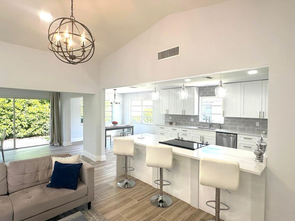 Photo of 10723 Greentrail Drive S, Boynton Beach, FL 33436 (MLS # R11124406)