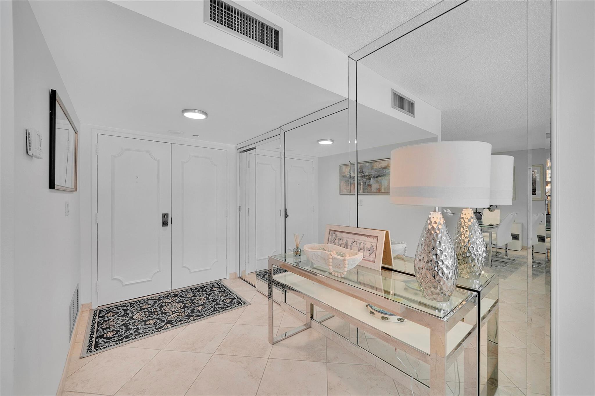 Experience the pinnacle of coastal living in this stunning 2-bedroom, 2-bathroom condo, offering breathtaking ocean views and tranquil poolside vistas. This residence blends luxury and comfort with exclusive access to a cutting-edge fitness center featuring separate facilities for men and women, a nearly fully redesigned heated pool area, a community lounge, a billiard room, and tennis courts for recreation. Located directly on the beachfront, the building boasts a resort-style atmosphere with state-of-the-art security, including facial recognition access. Just steps away from fine dining, lively nightlife, and essential conveniences, this home combines elegance with unmatched coastal convenience. Price just reduced—seize the opportunity today! Pool estimated to be completed by 8/2025.