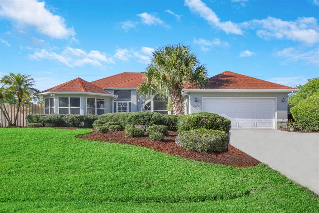 Photo of 1358 SW Del Rio Boulevard Blvd, Port St Lucie, FL 34953 (MLS # R10808471)