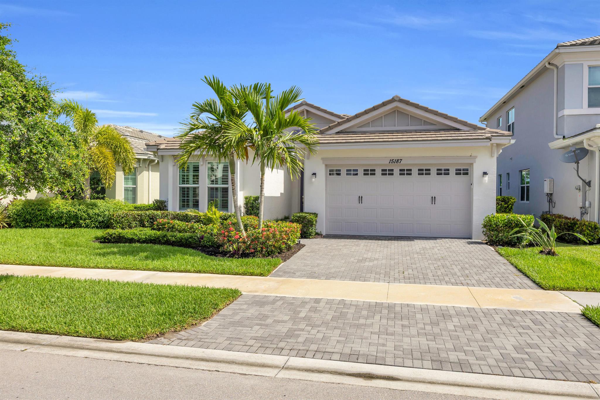 Step into this beautifully maintained true 3-bedroom, 2-bath single-family home, built in 2020 and designed for modern living. With Plantation Shutters throughout lending to being light, bright, and airy, the open-concept layout is enhanced by hurricane impact windows and panels and a sleek, contemporary aesthetic. Enjoy tranquil water views right from your backyard--perfect for morning coffee or evening unwinding. Located in the sought-after Meadows community in Westlake, you'll have access to top-tier amenities including a resort-style pool, state-of-the-art fitness center, dog park, playgrounds, and more. Live the lifestyle you deserve in this vibrant, growing area!