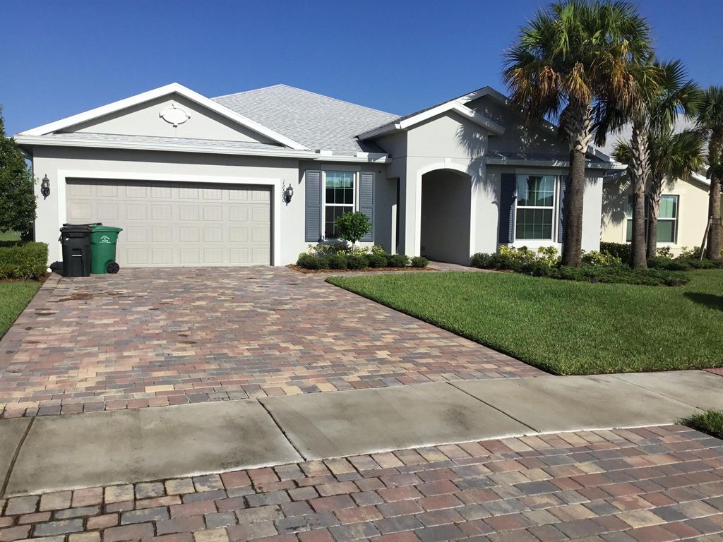 Photo of 12560 SW Key Deer Lane, Port Saint Lucie, FL 34987 (MLS # R10924157)
