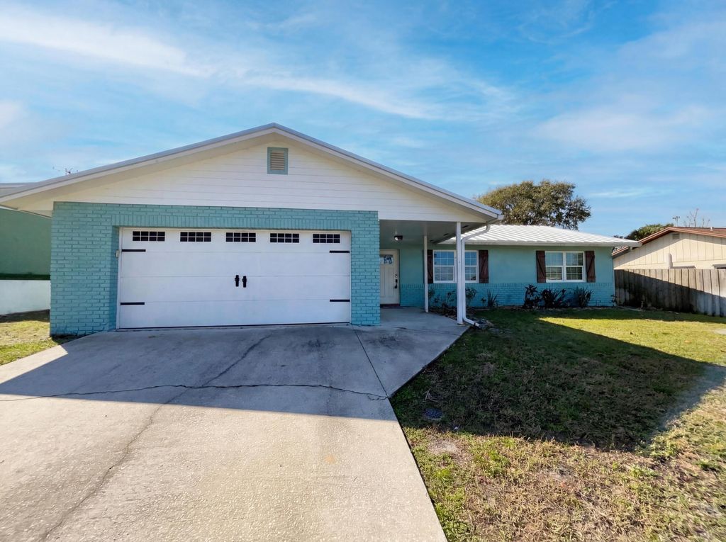 Photo of 1930 NE 23rd Terrace, Jensen Beach, FL 34957 (MLS # B26007443)